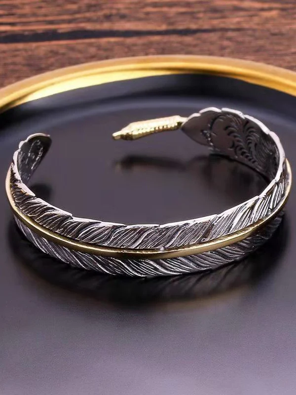 Feather bracelet with adjustable opening