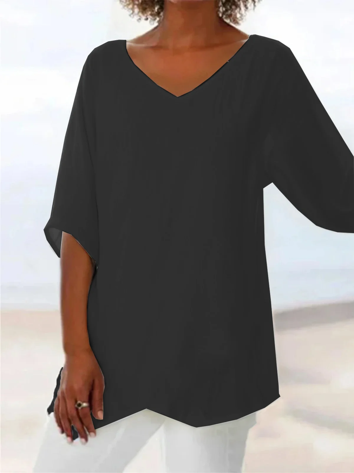 Women's Solid Color V-Neck Pointed Hem Blouse