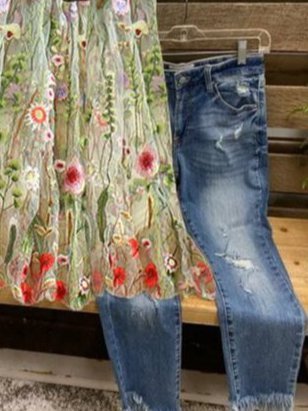 Flower embroidered sleeveless blouse